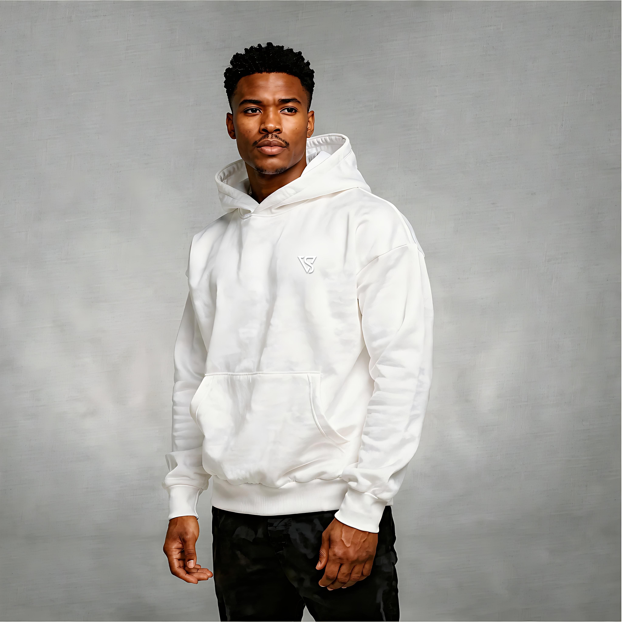Man wearing a white hoodie against a gray background