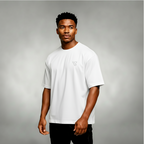 Man wearing a white t-shirt with a logo on a gray background