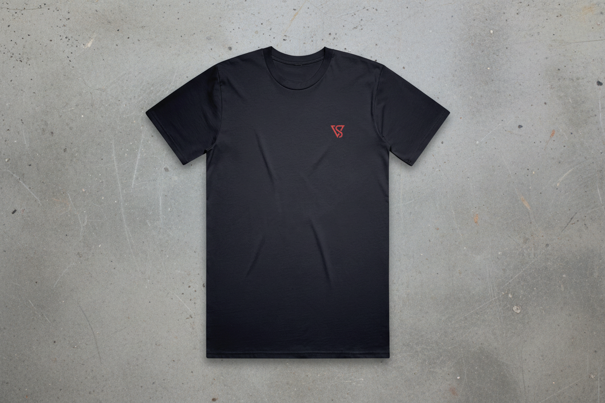Black t-shirt with a red logo on a conrete background
