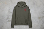 Green hoodie with a red logo on the chest against a white background