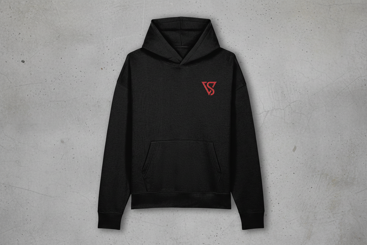 Black hoodie with a red logo on a gray concrete background