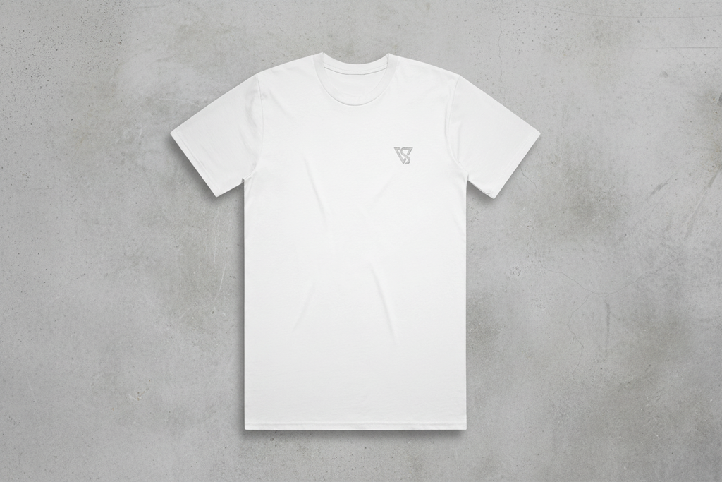 White t-shirt with a small logo on a white background